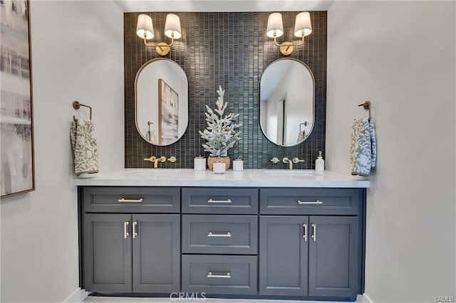 bathroom with decorative backsplash and vanity