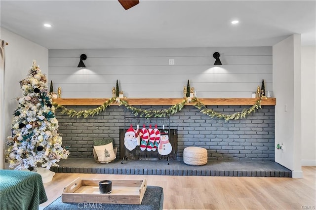 mudroom with wood-type flooring