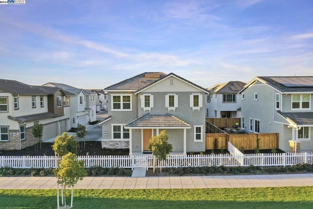 view of front facade featuring a front lawn