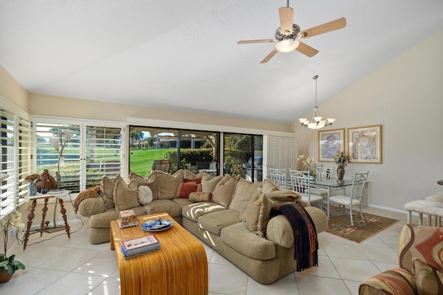 living room featuring light tile patterned floors, ceiling fan with notable chandelier, and high vaulted ceiling