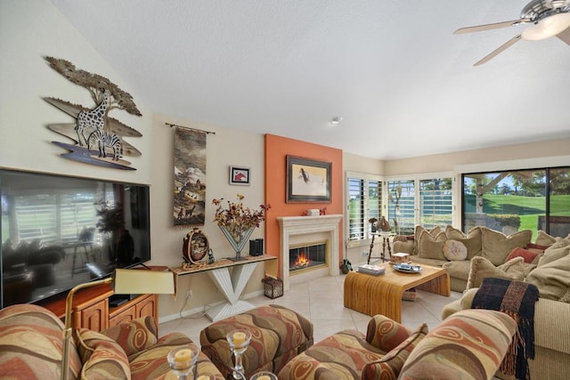 tiled living room with ceiling fan