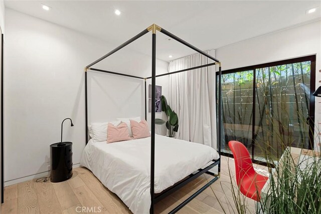 bedroom featuring light hardwood / wood-style flooring