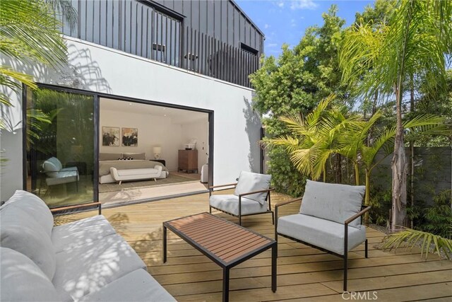 deck with an outdoor hangout area