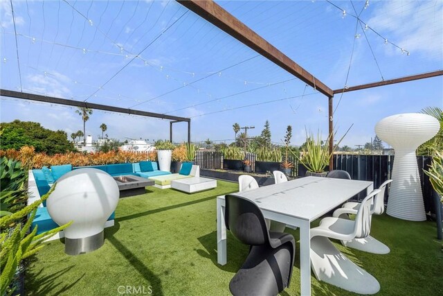 view of patio featuring a fire pit