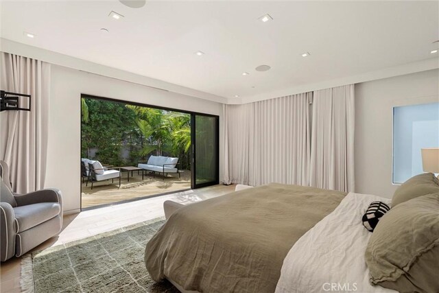 bedroom featuring light wood-type flooring