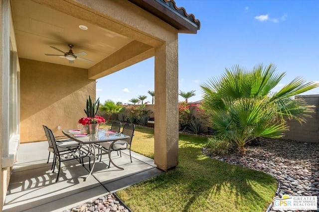 view of patio with ceiling fan