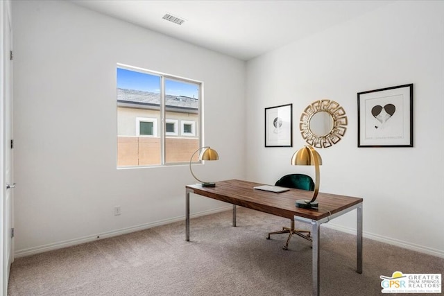 unfurnished office featuring carpet flooring