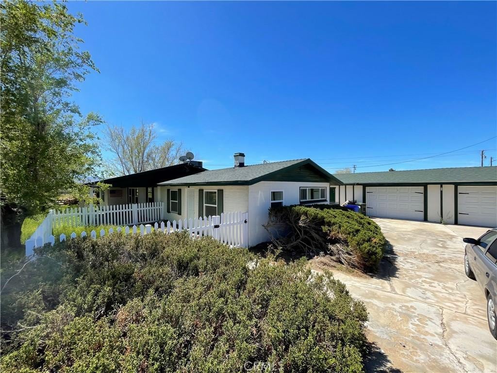 ranch-style home with a garage