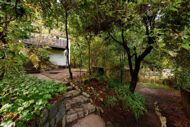 view of yard featuring a wooden deck