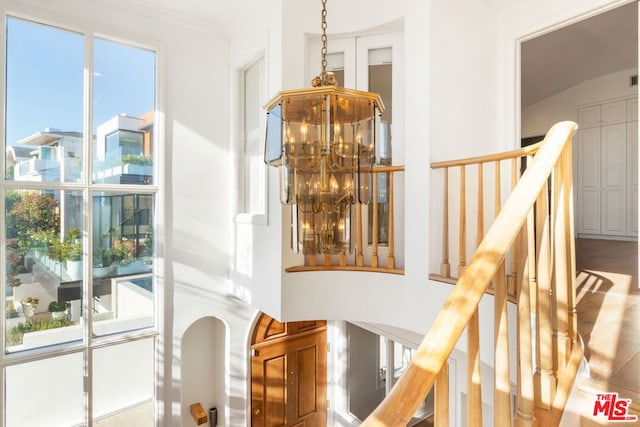 interior details featuring a chandelier