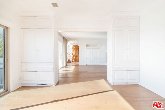 hallway featuring light hardwood / wood-style flooring