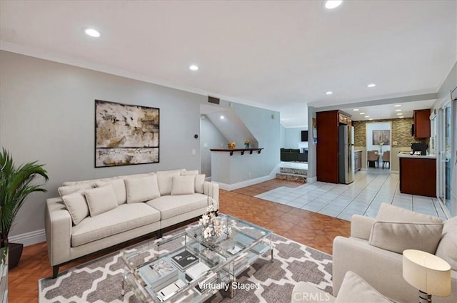 tiled living room with ornamental molding