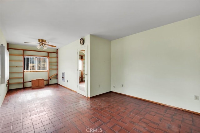 empty room with ceiling fan