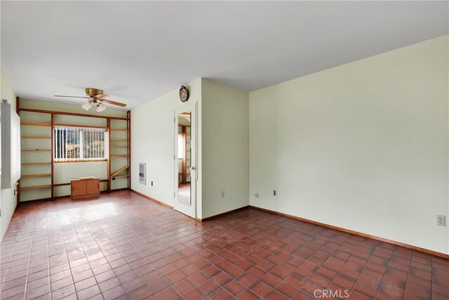 32222 Richard St, Lucerne Valley, CA 92356 - unfurnished room with baseboards and a ceiling fan