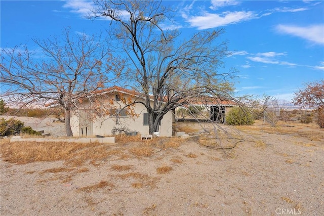 32222 Richard St, Lucerne Valley, CA 92356 - view of home's exterior with stucco siding