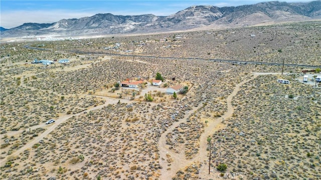 drone / aerial view featuring a mountain view