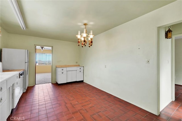 32222 Richard St, Lucerne Valley, CA 92356 - kitchen featuring hanging light fixtures, white cabinetry, a chandelier, and light countertops
