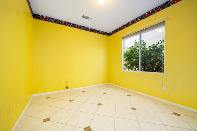 view of tiled spare room