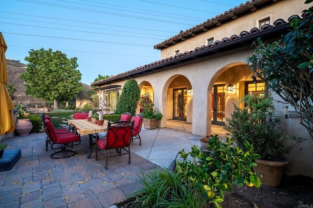 18669 Via Catania, Rancho Santa Fe, CA 92091 - view of patio / terrace with french doors and outdoor dining area