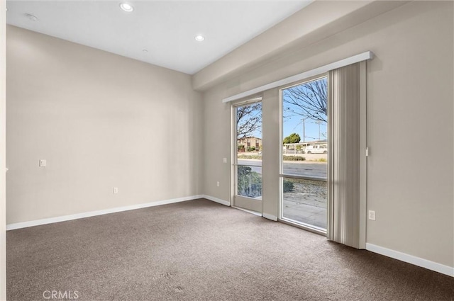 view of carpeted spare room