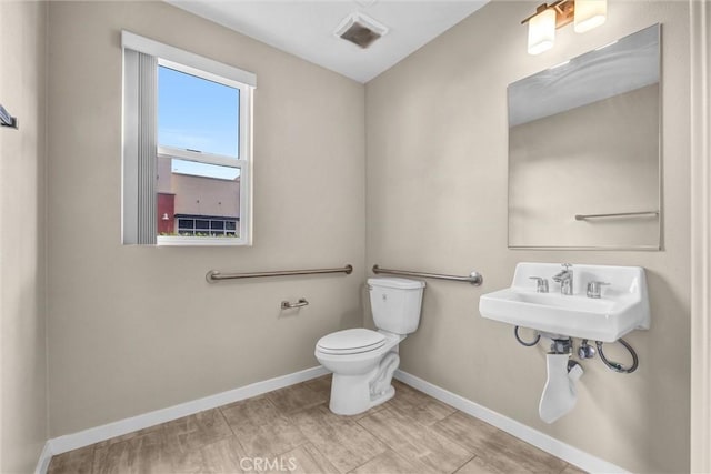 bathroom featuring toilet