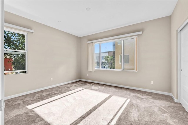 unfurnished bedroom with light carpet