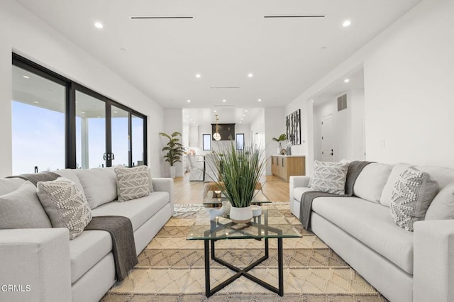 living room featuring hardwood / wood-style flooring and french doors