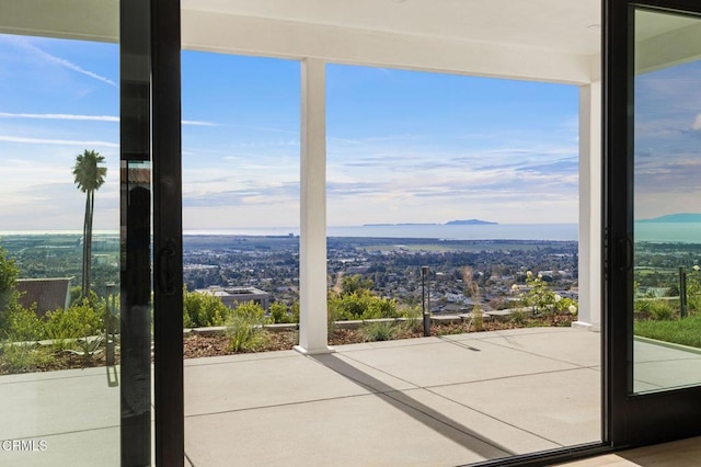 doorway to outside featuring a mountain view