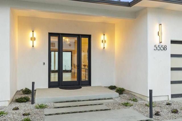 property entrance featuring french doors