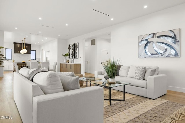 living room with light wood-type flooring