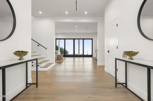 hallway featuring light wood-type flooring