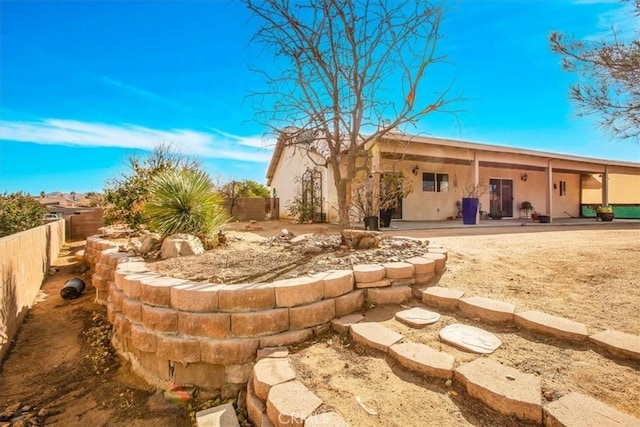 8550 Condalia Ave, Yucca Valley, CA 92284 - fenced backyard with a patio