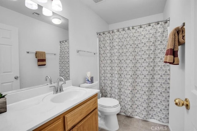 8550 Condalia Ave, Yucca Valley, CA 92284 - bathroom with vanity and tile patterned flooring