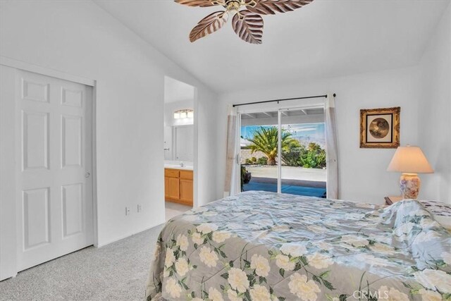 8550 Condalia Ave, Yucca Valley, CA 92284 - bedroom featuring access to outside, light carpet, vaulted ceiling, ensuite bath, and ceiling fan