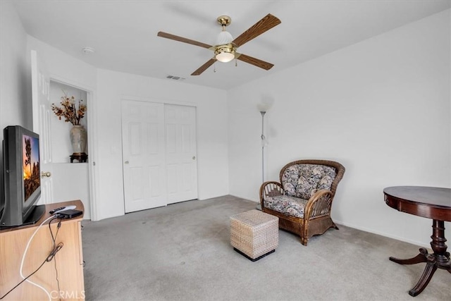 8550 Condalia Ave, Yucca Valley, CA 92284 - sitting room featuring ceiling fan and carpet floors