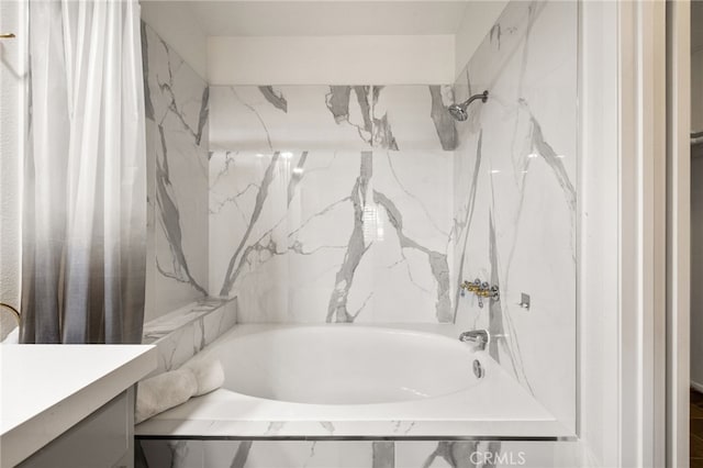 bathroom featuring shower / tub combo with curtain and vanity