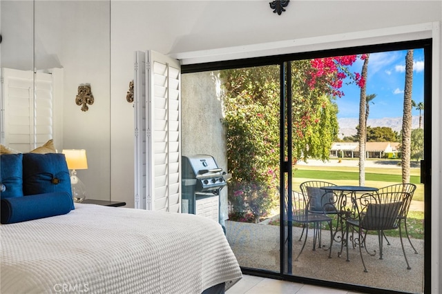 tiled bedroom with access to outside