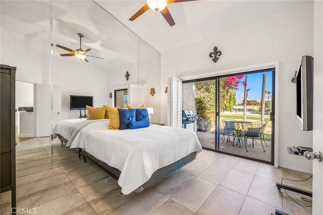 bedroom featuring light tile patterned floors, access to outside, high vaulted ceiling, and a ceiling fan