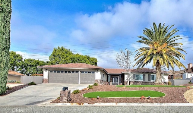 single story home with a front yard and a garage