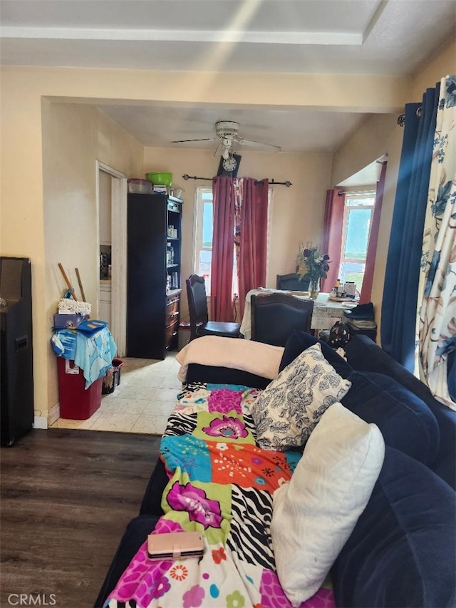 bedroom with wood-type flooring and ceiling fan