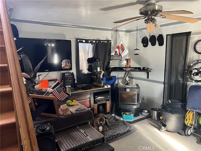 miscellaneous room with ceiling fan and light tile patterned floors