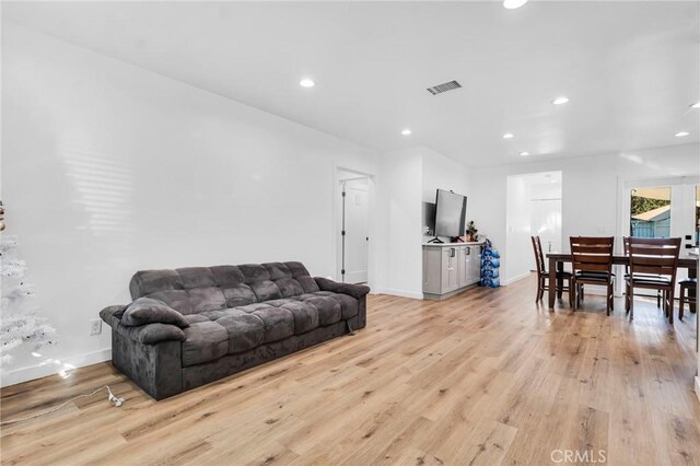 living room featuring light wood-type flooring