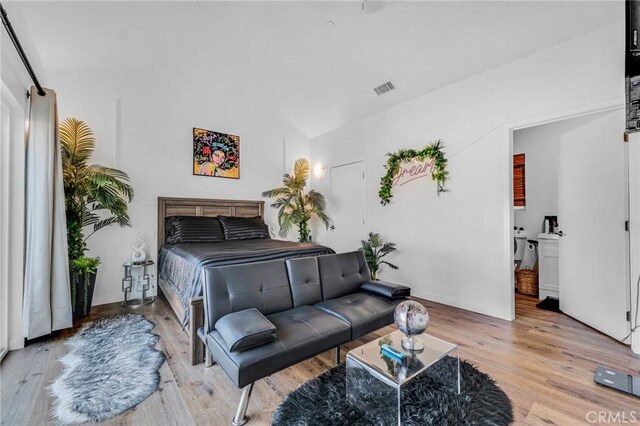 bedroom featuring light hardwood / wood-style floors