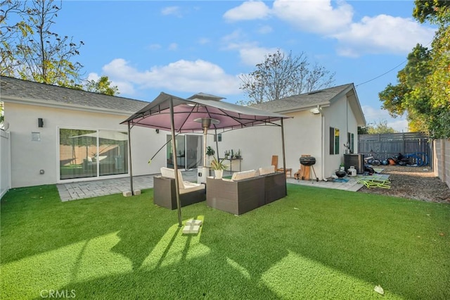 back of property featuring a yard, central AC, outdoor lounge area, and a patio