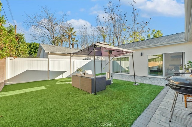 view of yard with an outdoor hangout area and a patio area