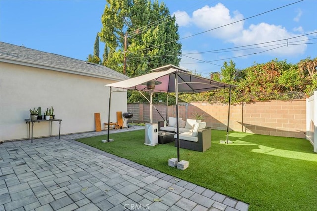 view of patio / terrace with area for grilling and an outdoor living space