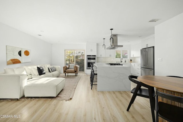 interior space with light hardwood / wood-style floors