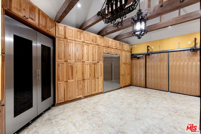 kitchen with stainless steel built in fridge and vaulted ceiling with beams