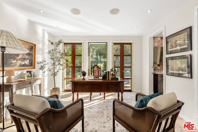 living area featuring french doors