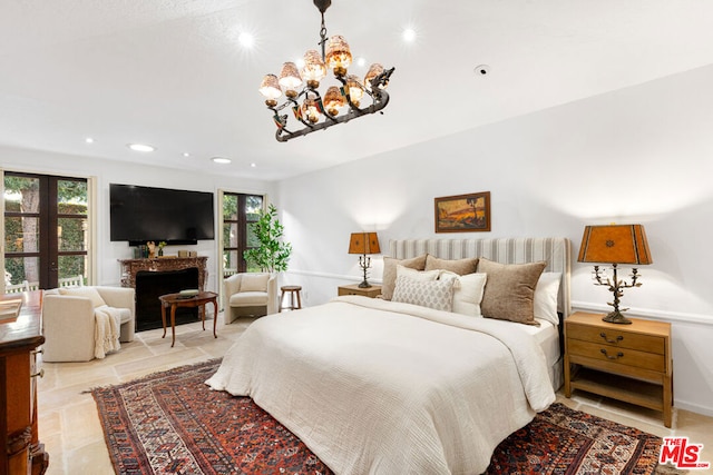 bedroom featuring a notable chandelier